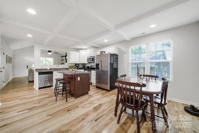 224 Eagle Creek Rd, Clover, SC 29710 - kitchen with stainless steel appliances, a kitchen island, light wood-style floors, plenty of natural light, and recessed lighting