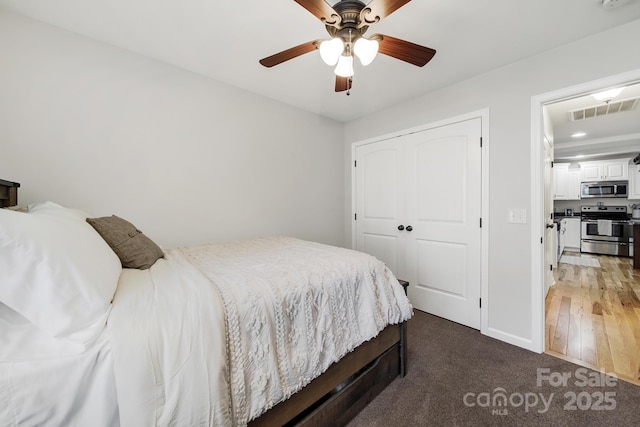 224 Eagle Creek Rd, Clover, SC 29710 - bedroom featuring a closet, ceiling fan, and carpet flooring