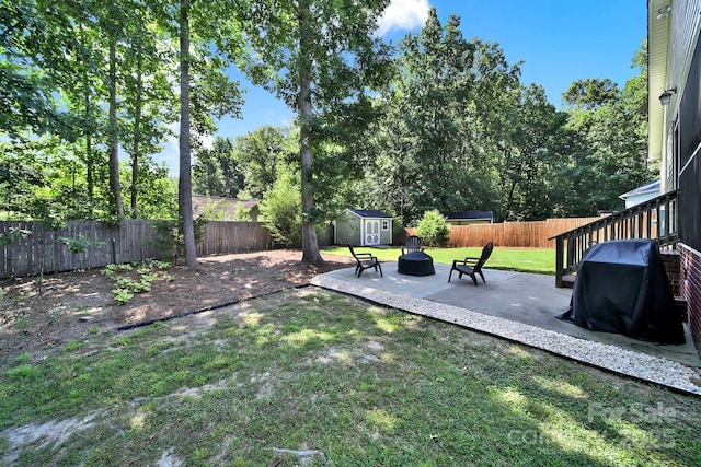 224 Eagle Creek Rd, Clover, SC 29710 - fenced backyard with a shed, a patio area, and an outdoor fire pit