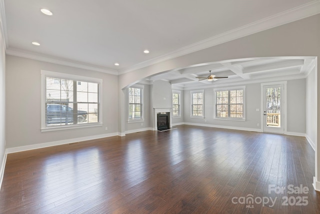 704 Kenway Loop, Mooresville, NC 28117 - unfurnished living room with plenty of natural light, ceiling fan, a high end fireplace, dark wood finished floors, and beam ceiling