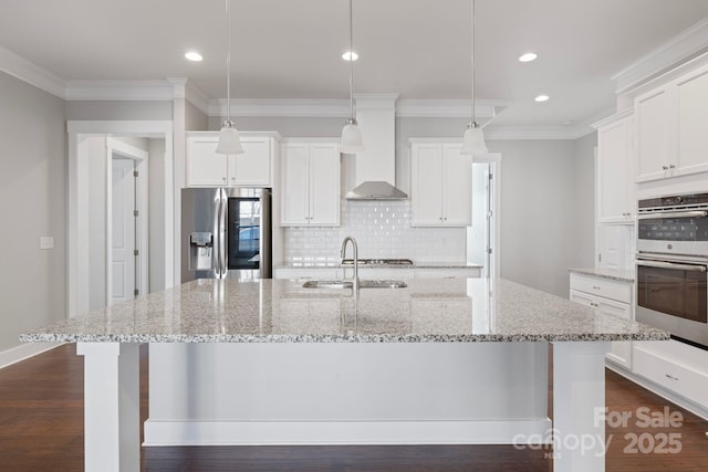 704 Kenway Loop, Mooresville, NC 28117 - kitchen with appliances with stainless steel finishes, decorative backsplash, an island with sink, white cabinets, and recessed lighting