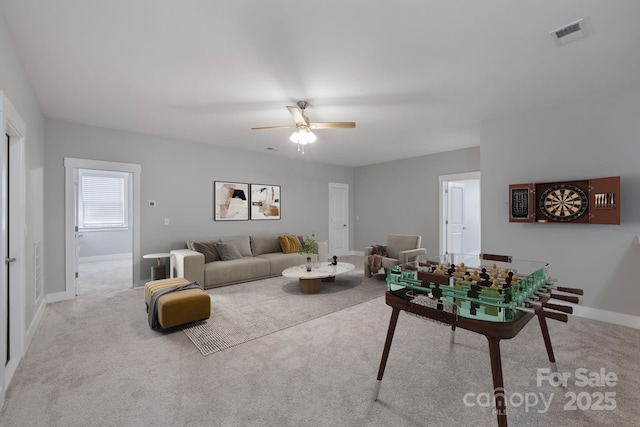 704 Kenway Loop, Mooresville, NC 28117 - living area featuring carpet floors and a ceiling fan