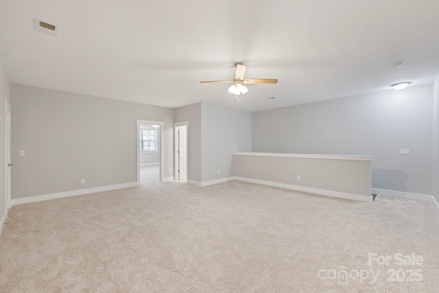 704 Kenway Loop, Mooresville, NC 28117 - spare room with ceiling fan and light carpet