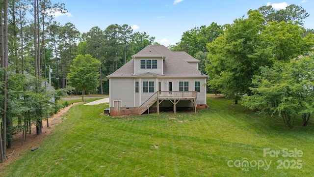 704 Kenway Loop, Mooresville, NC 28117 - rear view of house with stairway, a wooden deck, a yard, crawl space, and view of wooded area