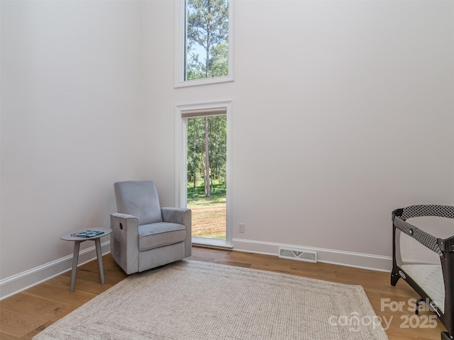 202 Walden Ln, Weddington, NC 28104 - sitting room with wood finished floors