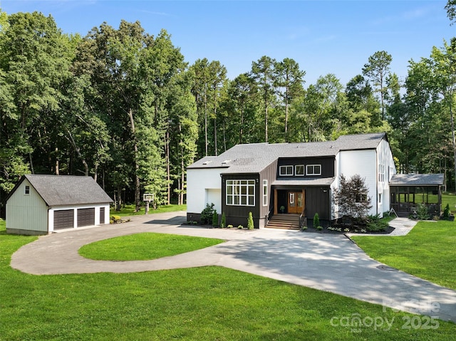 202 Walden Ln, Weddington, NC 28104 - view of front of home featuring an outbuilding, a front yard, and a garage