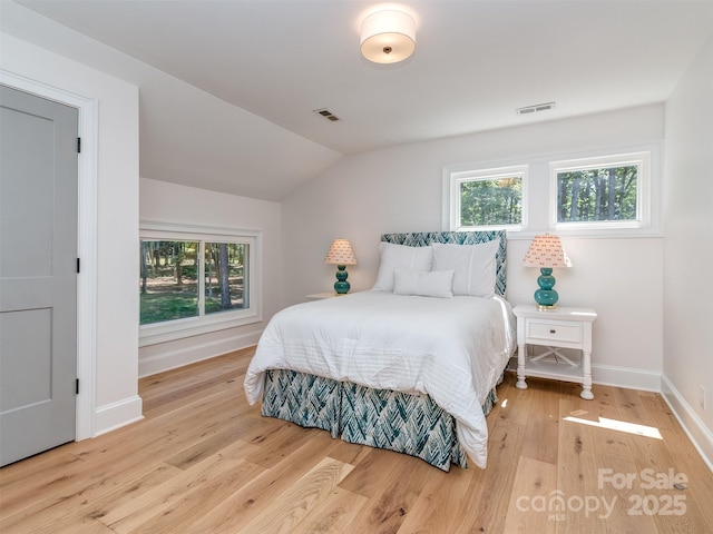 202 Walden Ln, Weddington, NC 28104 - bedroom featuring wood finished floors and vaulted ceiling