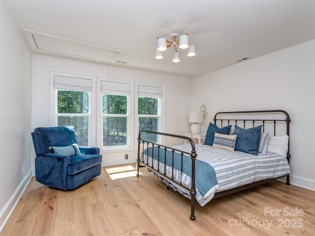 202 Walden Ln, Weddington, NC 28104 - bedroom featuring attic access and wood finished floors