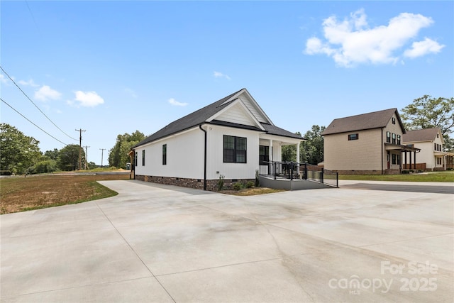 3511 Warlicks Church Rd, Connelly Springs, NC 28612 - view of front facade featuring crawl space, driveway, and covered porch