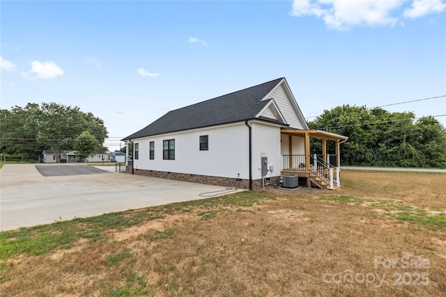3511 Warlicks Church Rd, Connelly Springs, NC 28612 - view of side of property with crawl space, a yard, roof with shingles, and concrete driveway