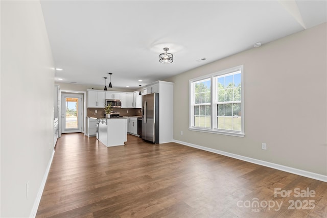 3511 Warlicks Church Rd, Connelly Springs, NC 28612 - unfurnished living room with dark wood-style flooring and recessed lighting