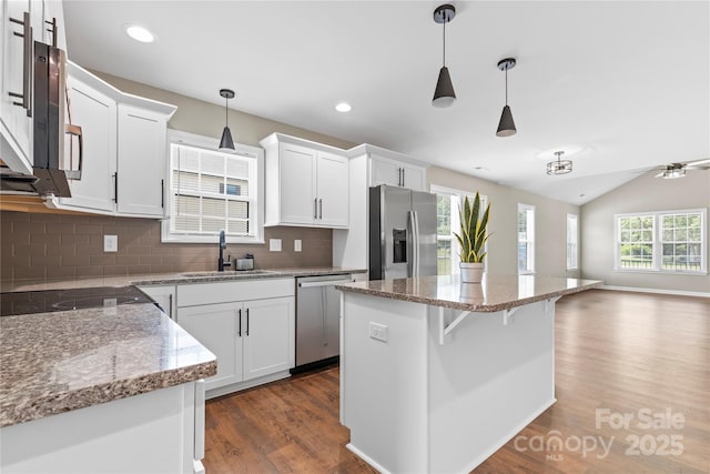 3511 Warlicks Church Rd, Connelly Springs, NC 28612 - kitchen with appliances with stainless steel finishes, dark wood-type flooring, open floor plan, decorative backsplash, and recessed lighting