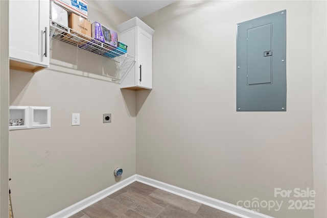 3511 Warlicks Church Rd, Connelly Springs, NC 28612 - laundry room with electric panel, electric dryer hookup, washer hookup, and cabinet space