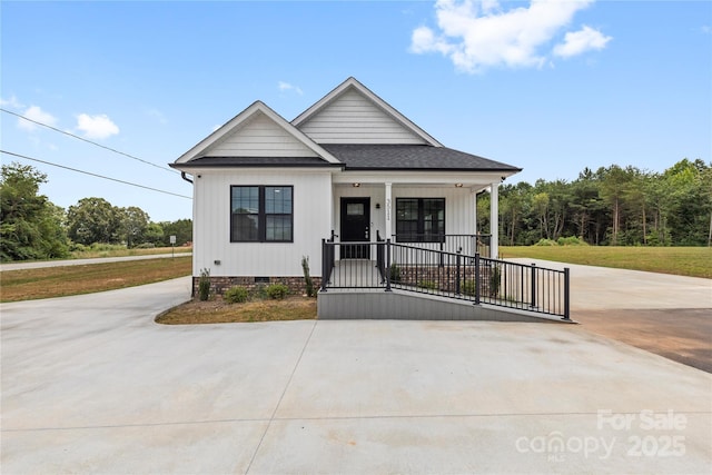 3511 Warlicks Church Rd, Connelly Springs, NC 28612 - view of front of house featuring crawl space, covered porch, a shingled roof, and driveway