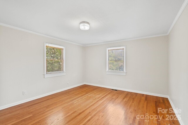211 Woodland Rd, Tryon, NC 28782 - unfurnished room with light wood-style floors and crown molding