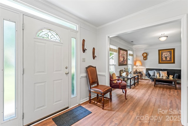 1109 Sunnyview Cir, Matthews, NC 28105 - foyer featuring wood finished floors, healthy amount of natural light, and ornamental molding