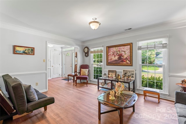 1109 Sunnyview Cir, Matthews, NC 28105 - living room featuring ornamental molding and wood finished floors