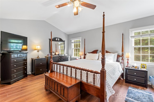 1109 Sunnyview Cir, Matthews, NC 28105 - bedroom featuring vaulted ceiling, light wood finished floors, and a ceiling fan