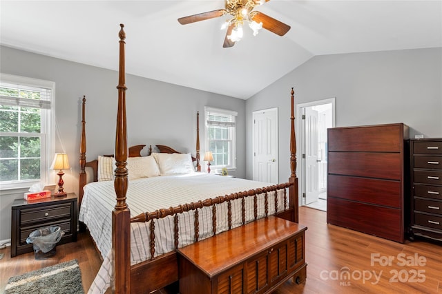 1109 Sunnyview Cir, Matthews, NC 28105 - bedroom featuring vaulted ceiling, wood finished floors, and a ceiling fan