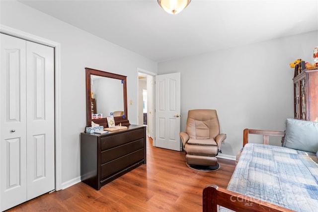 1109 Sunnyview Cir, Matthews, NC 28105 - bedroom featuring wood finished floors and a closet