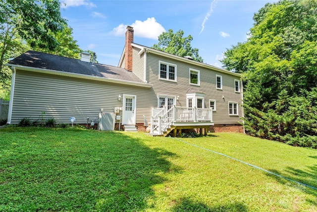 1109 Sunnyview Cir, Matthews, NC 28105 - back of property with a wooden deck, a yard, a chimney, and crawl space