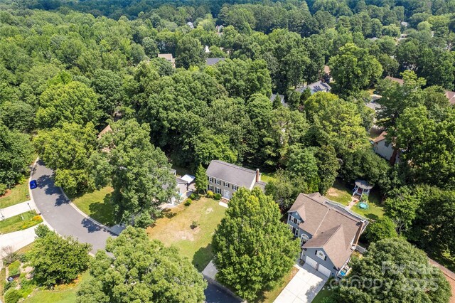 1109 Sunnyview Cir, Matthews, NC 28105 - aerial overview of property's location with a heavily wooded area