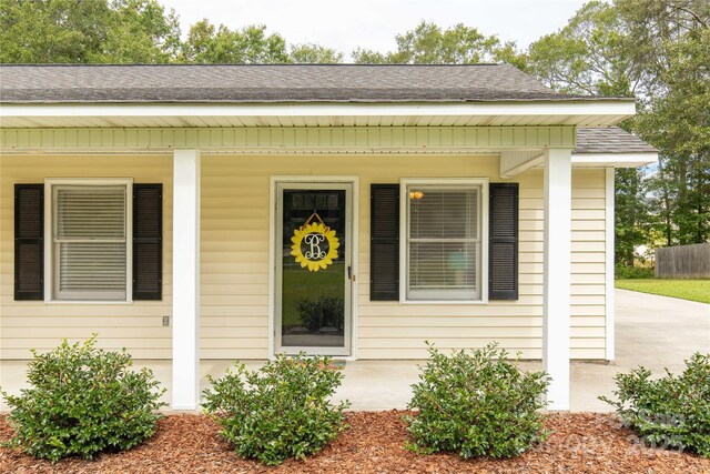 2460 Prince Dr, Lancaster, SC 29720 - entrance to property with covered porch and a shingled roof