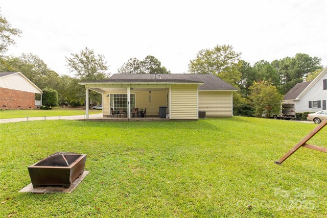 2460 Prince Dr, Lancaster, SC 29720 - rear view of house featuring a lawn and a patio area