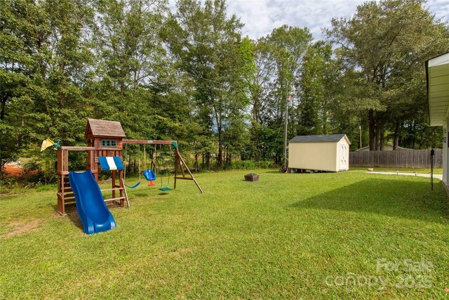 2460 Prince Dr, Lancaster, SC 29720 - view of yard featuring a shed, a playground, and view of scattered trees