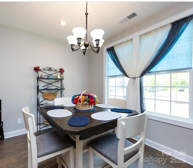 7337 Overjoyed Xing, Charlotte, NC 28215 - dining area with a chandelier, wood finished floors, and recessed lighting
