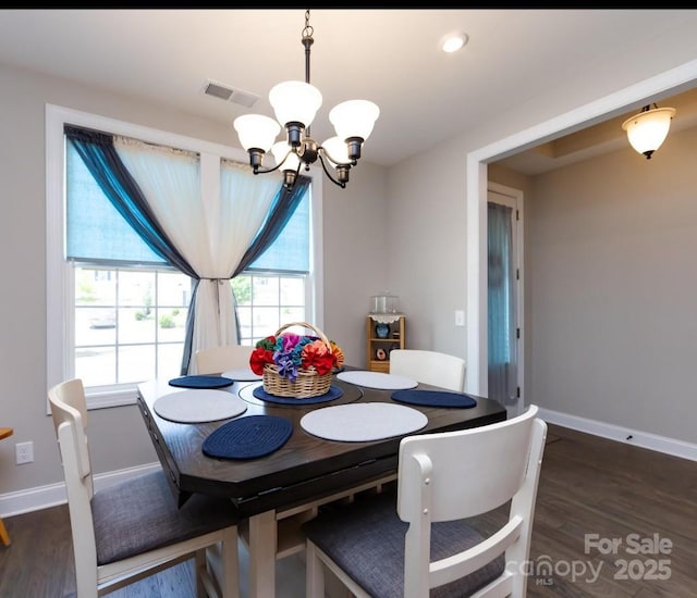 7337 Overjoyed Xing, Charlotte, NC 28215 - dining area featuring a chandelier, wood finished floors, and recessed lighting