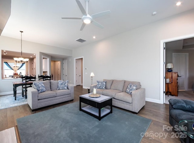 7337 Overjoyed Xing, Charlotte, NC 28215 - living room featuring a chandelier, a ceiling fan, wood finished floors, and recessed lighting