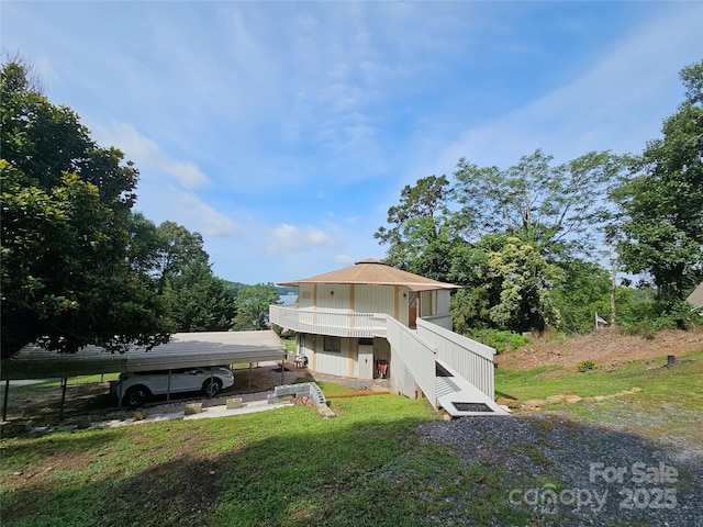 500 Steel Bridge Loop, Hickory, NC 28601 - view of front of property featuring a detached carport, stairway, and a front yard