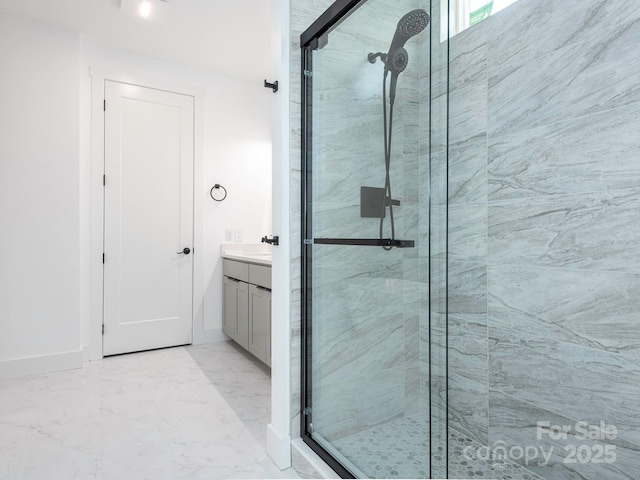 6548 Emerald Isle Dr, Sherrills Ford, NC 28673 - bathroom with a shower stall, vanity, and marble look tiles
