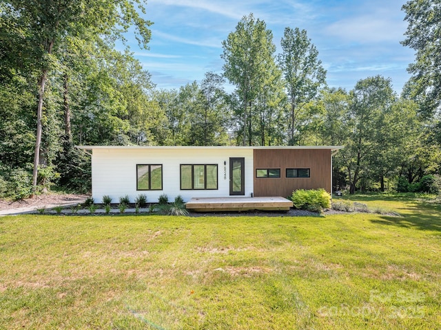 6548 Emerald Isle Dr, Sherrills Ford, NC 28673 - view of front of home featuring a deck and a front lawn
