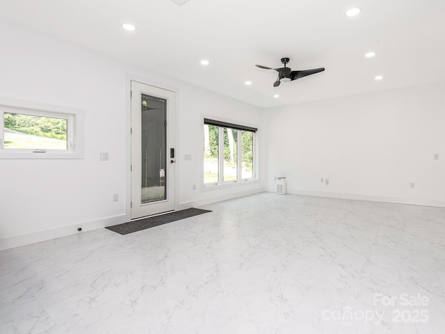 6548 Emerald Isle Dr, Sherrills Ford, NC 28673 - unfurnished room featuring recessed lighting, plenty of natural light, ceiling fan, and marble finish flooring