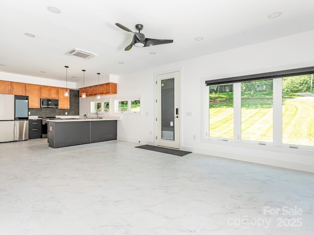 6548 Emerald Isle Dr, Sherrills Ford, NC 28673 - living room featuring ceiling fan and baseboards