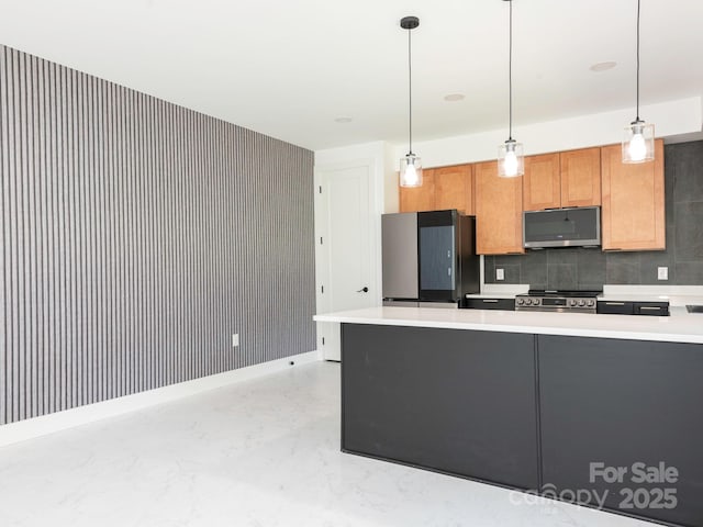 6548 Emerald Isle Dr, Sherrills Ford, NC 28673 - kitchen featuring stainless steel appliances, light countertops, hanging light fixtures, and tasteful backsplash