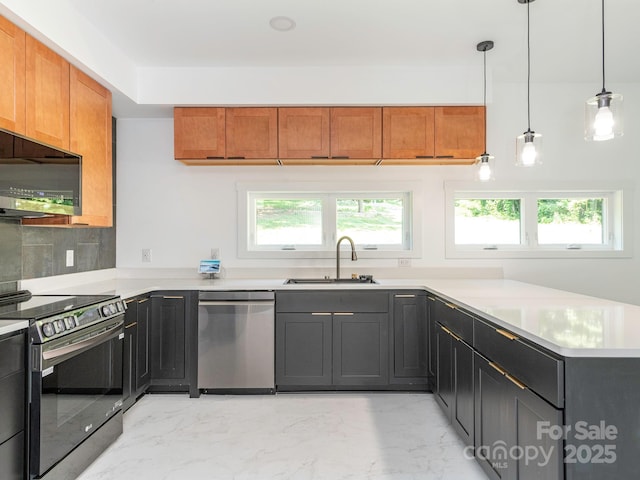 6548 Emerald Isle Dr, Sherrills Ford, NC 28673 - kitchen with appliances with stainless steel finishes, plenty of natural light, light countertops, and light marble finish flooring