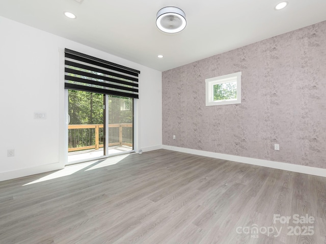 6548 Emerald Isle Dr, Sherrills Ford, NC 28673 - unfurnished room with wood finished floors and recessed lighting