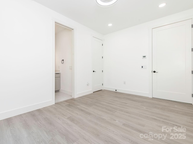 6548 Emerald Isle Dr, Sherrills Ford, NC 28673 - spare room featuring light wood-style flooring and recessed lighting