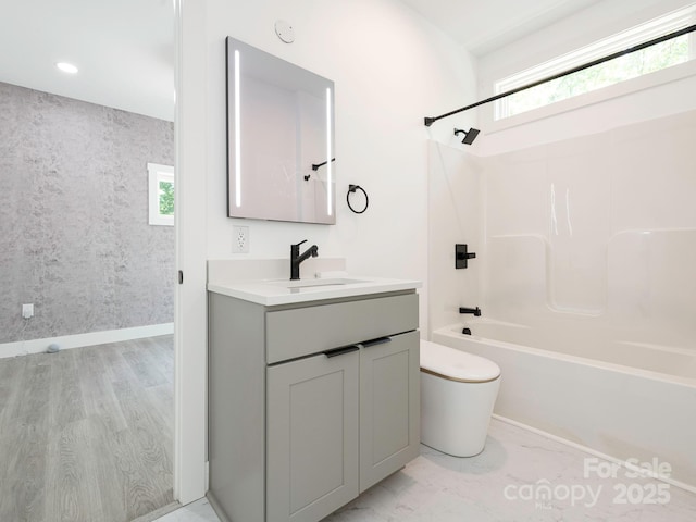 6548 Emerald Isle Dr, Sherrills Ford, NC 28673 - bathroom featuring healthy amount of natural light, vanity, tub / shower combination, and wood finished floors