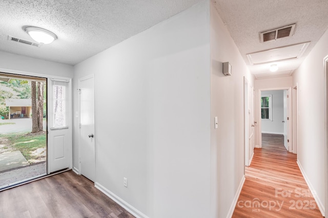 6513 Old Post Rd, Charlotte, NC 28212 - foyer featuring a textured ceiling and wood finished floors