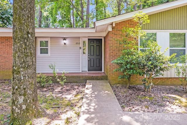 6513 Old Post Rd, Charlotte, NC 28212 - view of exterior entry featuring brick siding