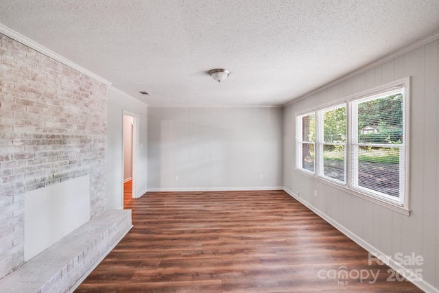 6513 Old Post Rd, Charlotte, NC 28212 - empty room with ornamental molding, a textured ceiling, and wood finished floors