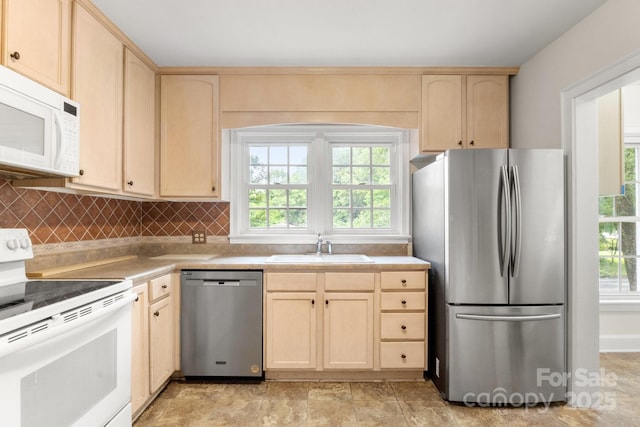 728 Blanton St, Shelby, NC 28150 - kitchen featuring stainless steel appliances, light brown cabinets, tasteful backsplash, and light countertops