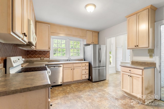 728 Blanton St, Shelby, NC 28150 - kitchen with appliances with stainless steel finishes, light brown cabinetry, and tasteful backsplash