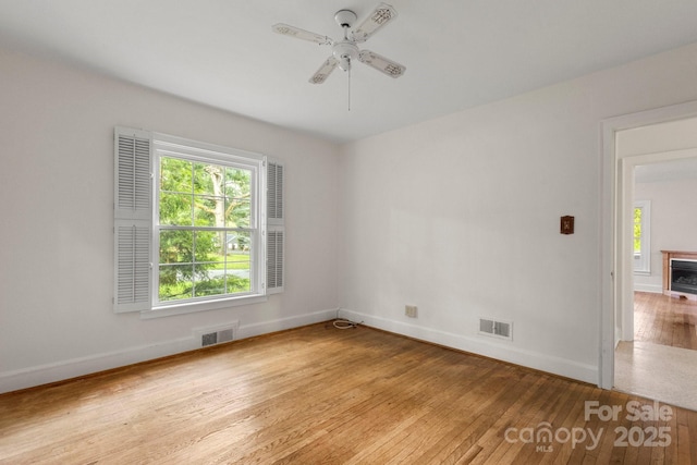 728 Blanton St, Shelby, NC 28150 - spare room with light wood-type flooring and ceiling fan