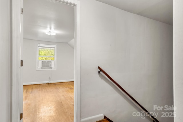 728 Blanton St, Shelby, NC 28150 - stairway with wood finished floors, cooling unit, and vaulted ceiling