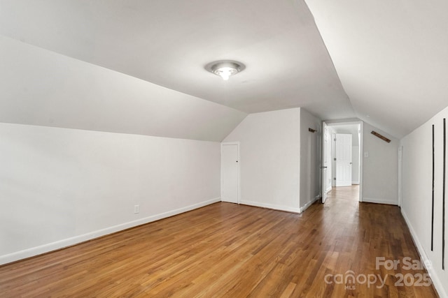 728 Blanton St, Shelby, NC 28150 - additional living space featuring wood finished floors and vaulted ceiling